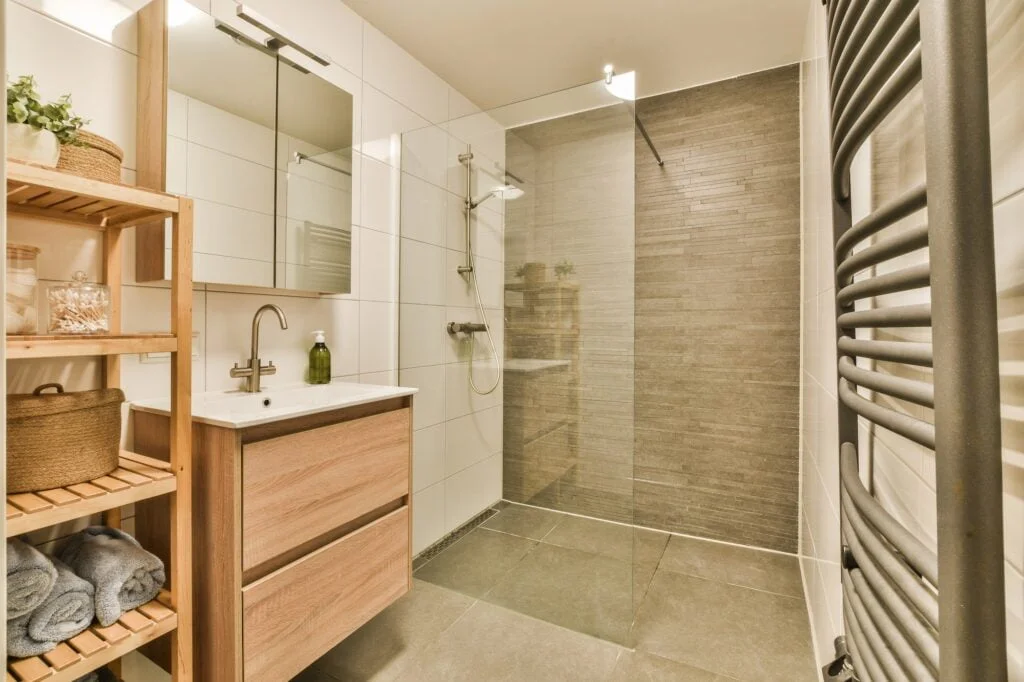 a bathroom with a shower and a sink